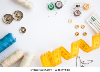 Sewing notions (tools) on a white ground - Shutterstock ID 1338497588