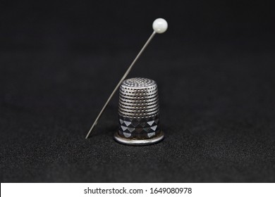 sewing objects thimble threads needle