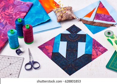 Sewing Patchwork Of Block Anchor Surrounded By Accessories