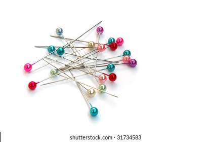 Sewing Pins On A White Background