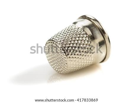 sewing thimble isolated on white background