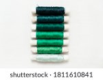 Sewing thread in gradiation of green 