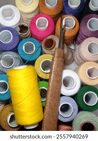 Sewing tools and threads stack together 