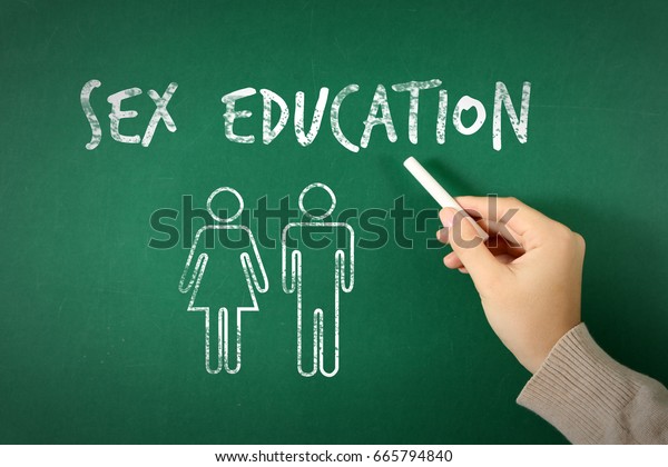 Sex Education Concept Woman Writing On Blackboard Closeup 5053