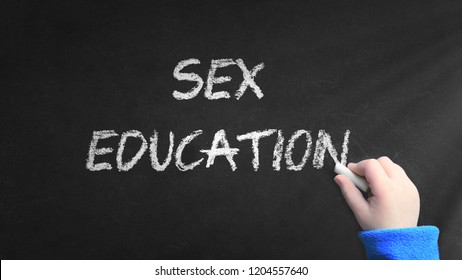 Sex Education Word Written On A Blackboard In A Classroom During A Sexual Lecture At School. Empty Copy Space For Editor's Text.