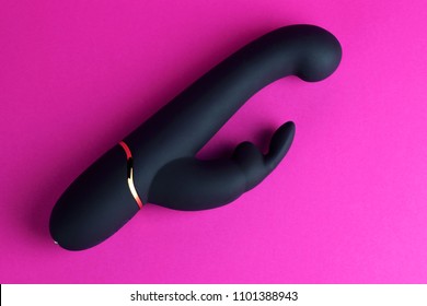 Sex toy for adult, design dildo vibrator isolated on pink background