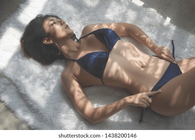 Sexy Asian Woman In Room Wear Blue Bikini