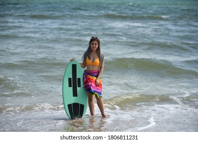 Sexy Beautiful Asian Surfer Woman In Bikini Swimwear With Surfboard On The Beach/Extreme Sport On Summer Holiday Vacation