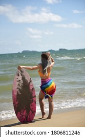 Sexy Beautiful Asian Surfer Woman In Bikini Swimwear With Surfboard On The Beach/Extreme Sport On Summer Holiday Vacation