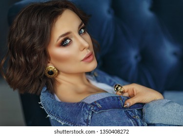 Sexy Beautiful Model Brunette Girl With Blue Eyes In Blue Denim. Beauty Portrait, Close Up