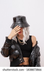 Sexy Blonde Model In Fashion Urban Street Outfit. Trendy Black Bucket Hat And Bomber. Daring Jewelry  Stylish Fall Winter Seasons
