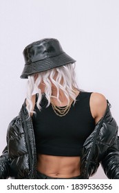 Sexy Blonde Model In Fashion Urban Street Outfit. Trendy Black Bucket Hat And Bomber. Daring Jewelry  Stylish Fall Winter Seasons. Rap Hip Hop Vibes