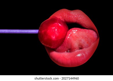 Sexy blow jobs symbol. Licking candy. Lollipop model. Woman lips sucking a candy. Glamor sexy model with red lips eat sweats lolly pop. Night club background.