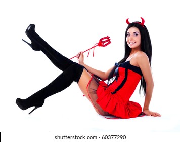 Sexy Brunette Girl Wearing A Halloween Costume Of An Imp