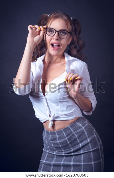 Glasses schoolgirl model tugging