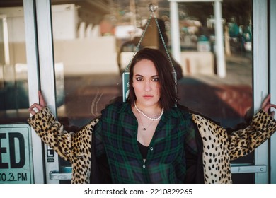 Sexy Brunette Woman In Fashionable Vintage Cheetah Print Coat Posing At Golden Hour In Sunlight In Los Angeles