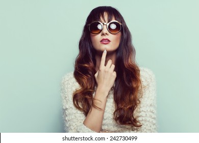 Sexy Brunette Woman In Sweater With Sunglasses. Ombre Hair