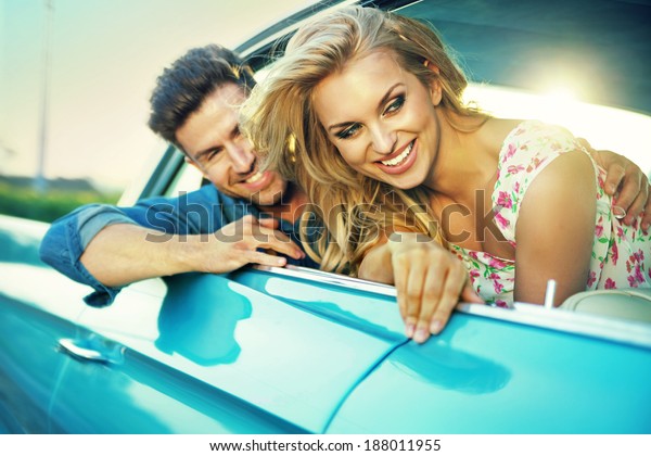 Sexy couple in the\
car