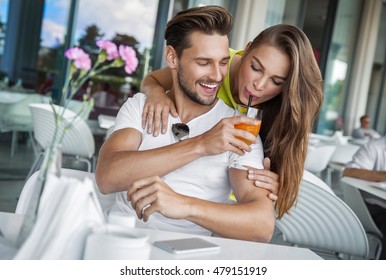 Sexy Couple Drinking Orange Juice 