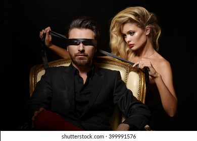 Sexy Couple Love,  Blindfold Man in Suit with sexy blonde woman
