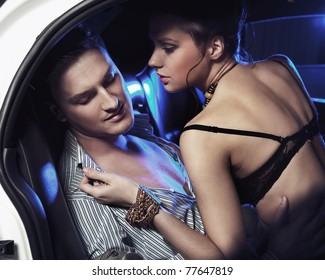Sexy couple makin love in a car