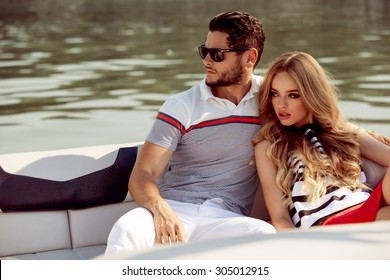 Sexy Couple On The Luxury Boat
