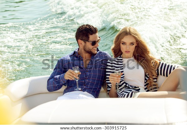 Sexy Couple On Luxury Boat Stock Photo (Edit Now) 303915725