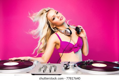 sexy dj woman on pink background