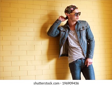 Sexy Fashion Man With Beard Dressed Casual Smiling Brick Wall