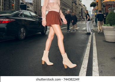 Sexy Female With Long Legs Wearing Mini Skirt And Shoes Crossing City Street