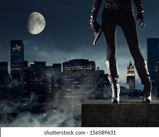 Sexy Female Thief With Gun, New York On Background