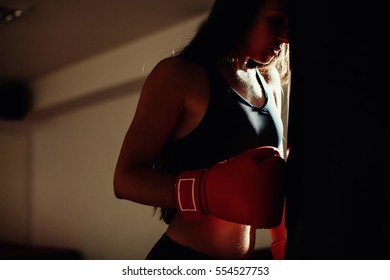 Sexy Fighter Girl In Gym With Boxing Bag. Long Hair Woman Fitness Ufc Model