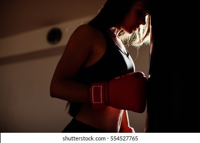 Sexy Fighter Girl In Gym With Boxing Bag. Long Hair Woman Fitness Ufc Model