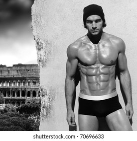 Sexy Fine Art Black And White Portrait Of A Very Muscular Shirtless Male Model Posing With View Of Rome In The Background