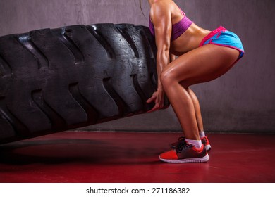 Sexy And Fit Girl Performed Excersise With Tire.