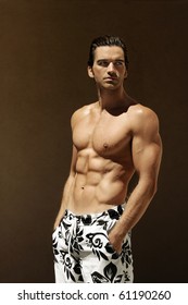 Sexy Fitness Model In Swim Trunks With Copy Space