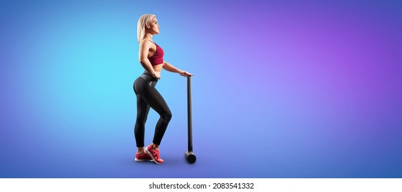 Sexy Fitness Woman Is Posing With The Sledgehammer.