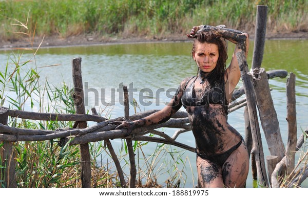 Sexy Babe In Mud