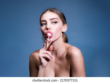 Sexy Girl Face. Close-up Portrait Of Nice Alluring Charming Glamorous Sweet Sexy Lady With Lollipop In Mouth. Young Sexy Model. Sucking Licking Red Sweet Candy.