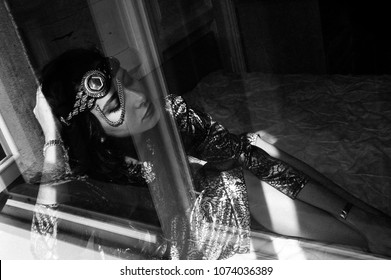 A Sexy Girl With A Gold Jewel On Her Head Red Lips And A Black A Sexy Girl With A Gold Jewel On Her Head Red Lips And A Black