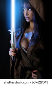 Sexy Girl Holding A Light Saber 