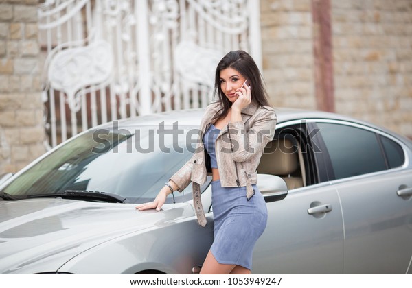 sexy girl on the expensive\
car