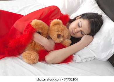 Sexy girl sleeps with teddy bear
