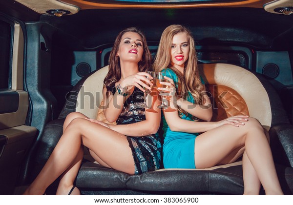 Sexy girls. Party in
the car. Limousine.