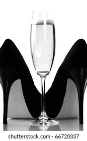 Sexy High Heels And Champange Or Sparkling Wine Glass