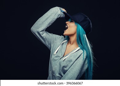 Sexy Hip Hop Woman With Cap In Hoodie