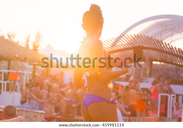 Sexy Hot Girl Wearing Brazilian Bikini Dancing On A Beach Party Event