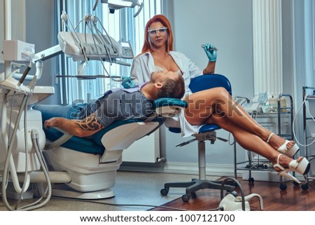 Redhead and dentist