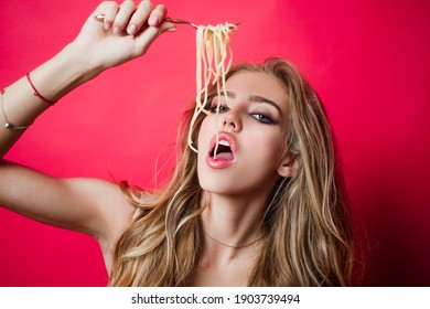 Sexy Kitchen. Girl Eat Spaghetti. Woman Italian Cuisine Eating Pasta With Her Hands And Mouth