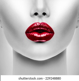 Sexy Lips. Beauty Red Lip Makeup Detail. Beautiful Make-up Closeup. Sensual Open Mouth. lipstick or Lipgloss. Kiss. Beauty Model Woman's Face close-up 